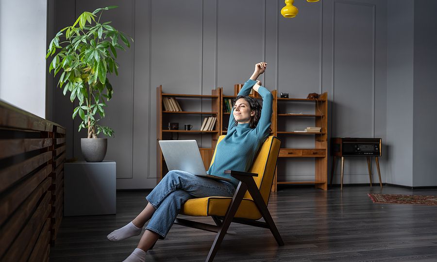 Young Satisfied Woman Remote Worker Relaxing, Stretching Arms Wh